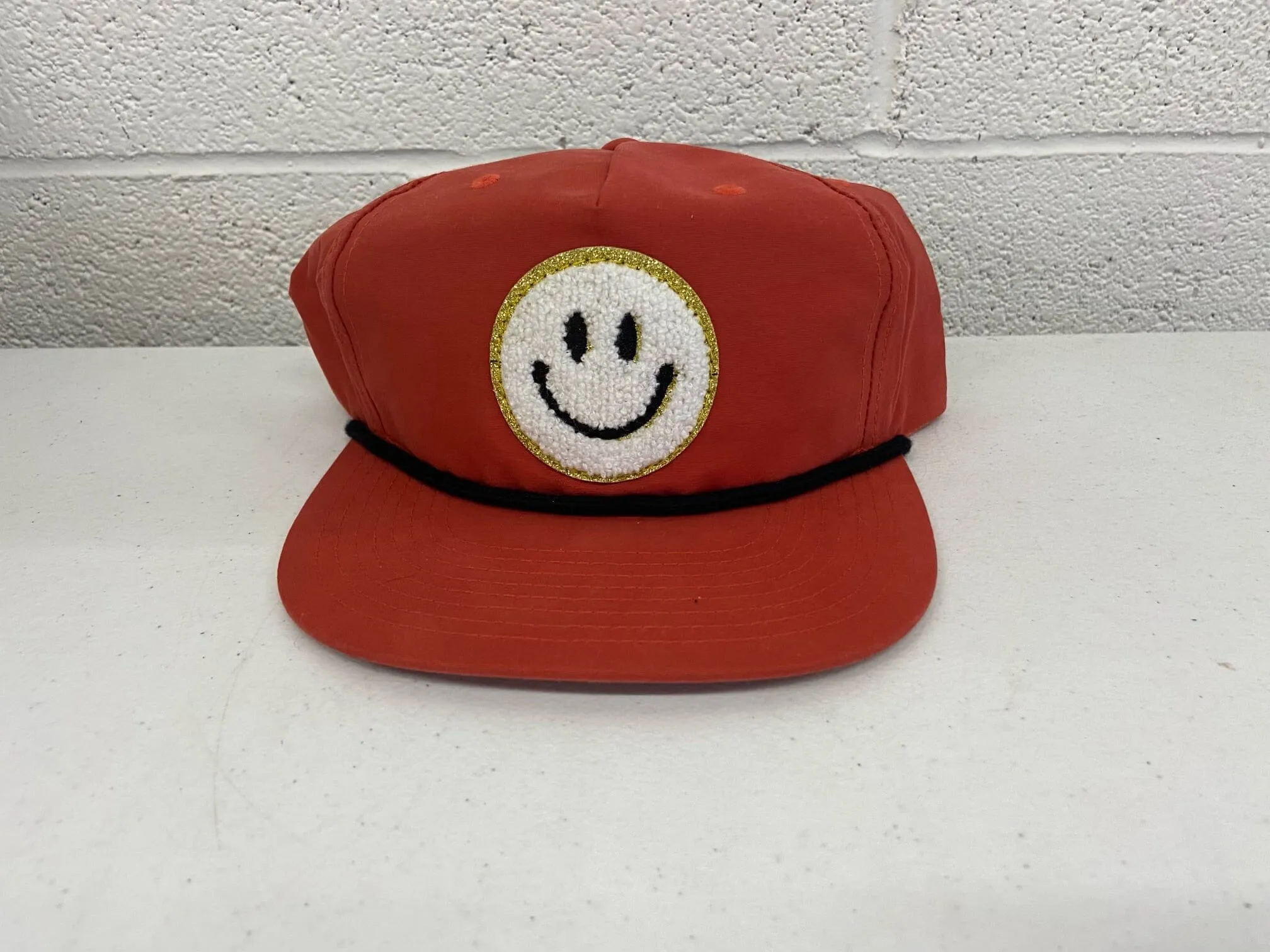 Red Fuzzy Smiley Face Hat